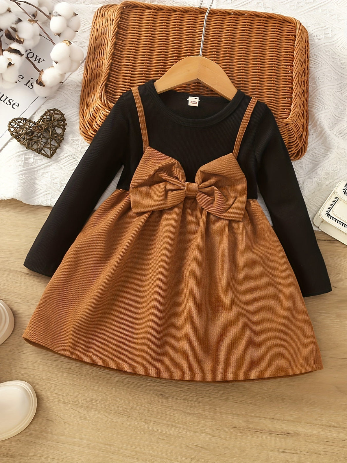 Discover the Charming Velvet Bow Dress for kids. Perfect for winter festivities, combining comfort, style, and practicality. Shop now at Toosly.
