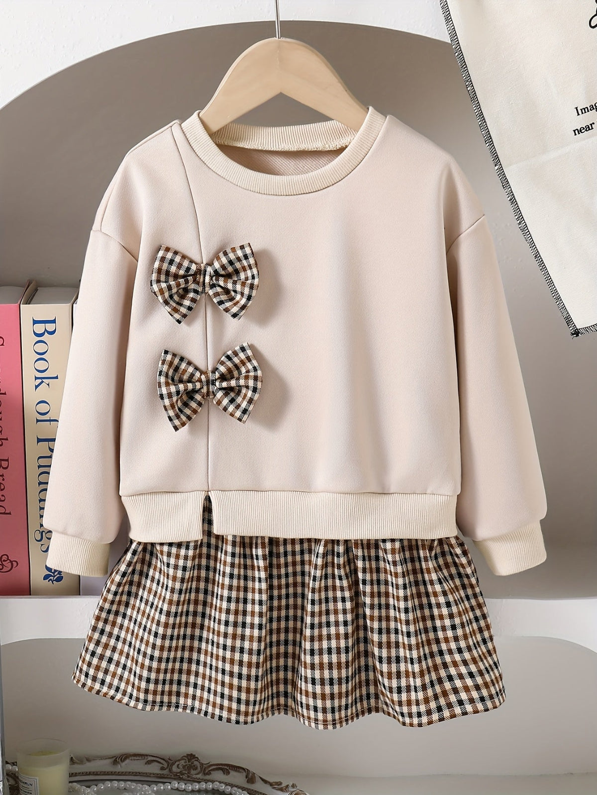 Discover the Charming Plaid Dress with Bow for Girls. Perfect for autumn and winter, offering comfort and style. Explore more at Toosly.