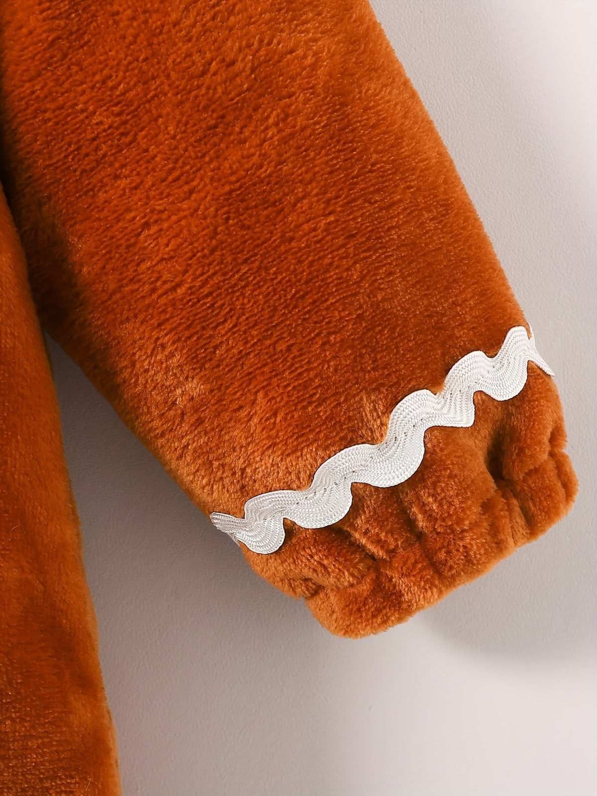 Discover warmth and fun with the Cozy Cartoon Hooded Winter Onesie for kids. Perfect for outdoor adventures, this onesie combines comfort and charm.