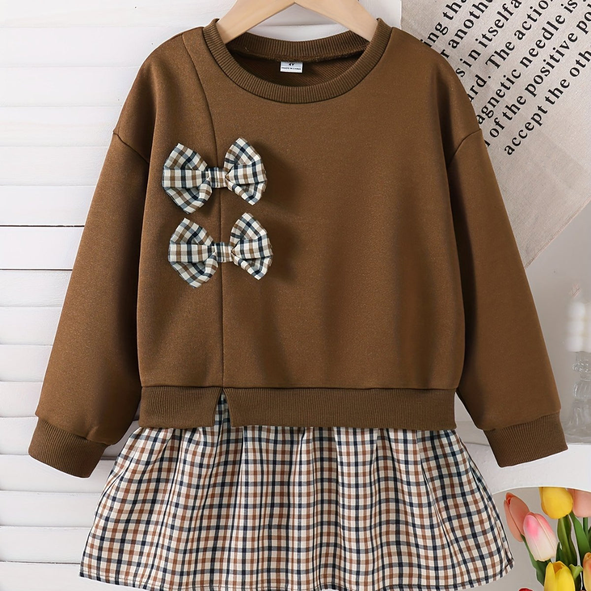 Discover the Charming Plaid Dress with Bow for Girls. Perfect for autumn and winter, offering comfort and style. Explore more at Toosly.