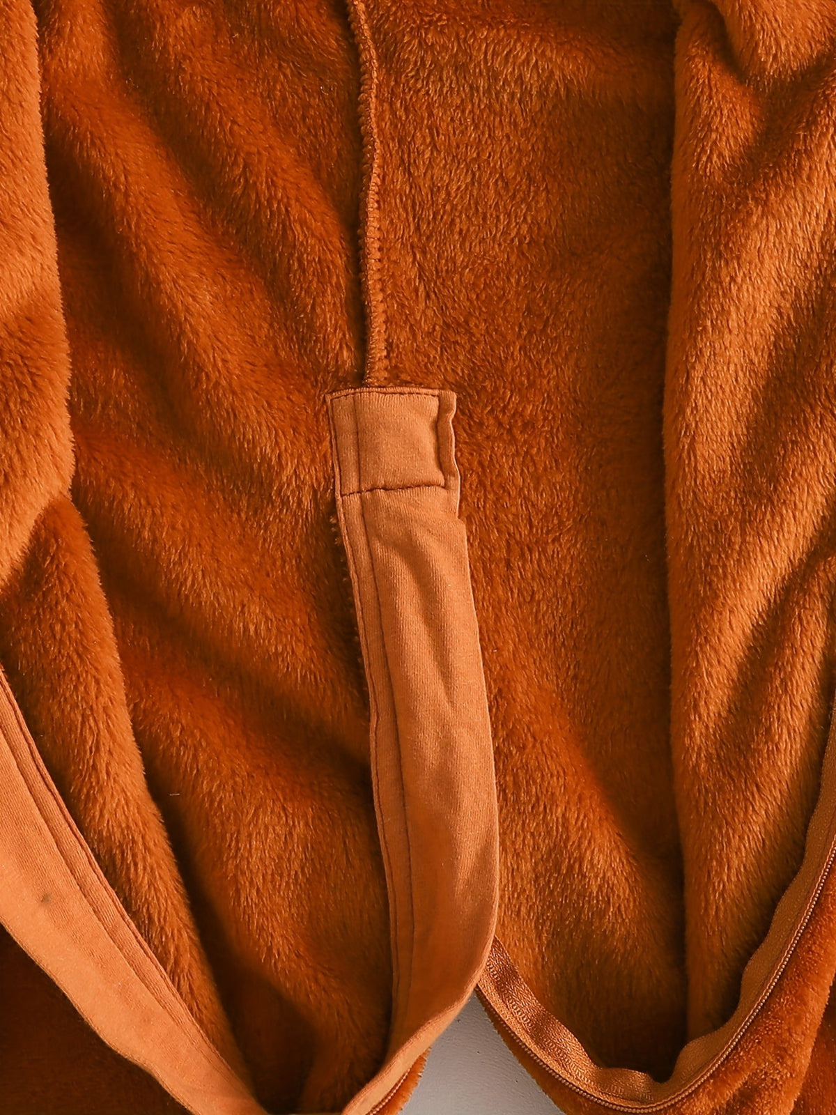 Discover warmth and fun with the Cozy Cartoon Hooded Winter Onesie for kids. Perfect for outdoor adventures, this onesie combines comfort and charm.