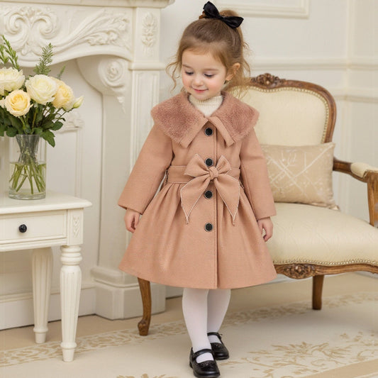 Keep your baby girl warm and stylish with our Winter Coat featuring a plush collar and bow. Perfect for chilly days.