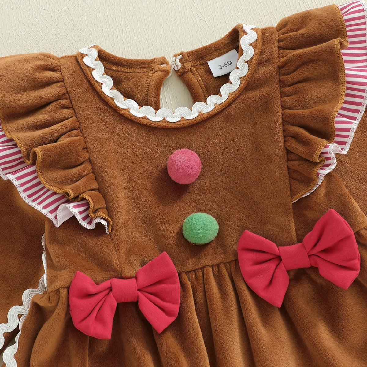 Discover the Charming Holiday Romper for Baby Girls. Soft, cozy, and perfect for festive moments. Ideal for 0-18 months.