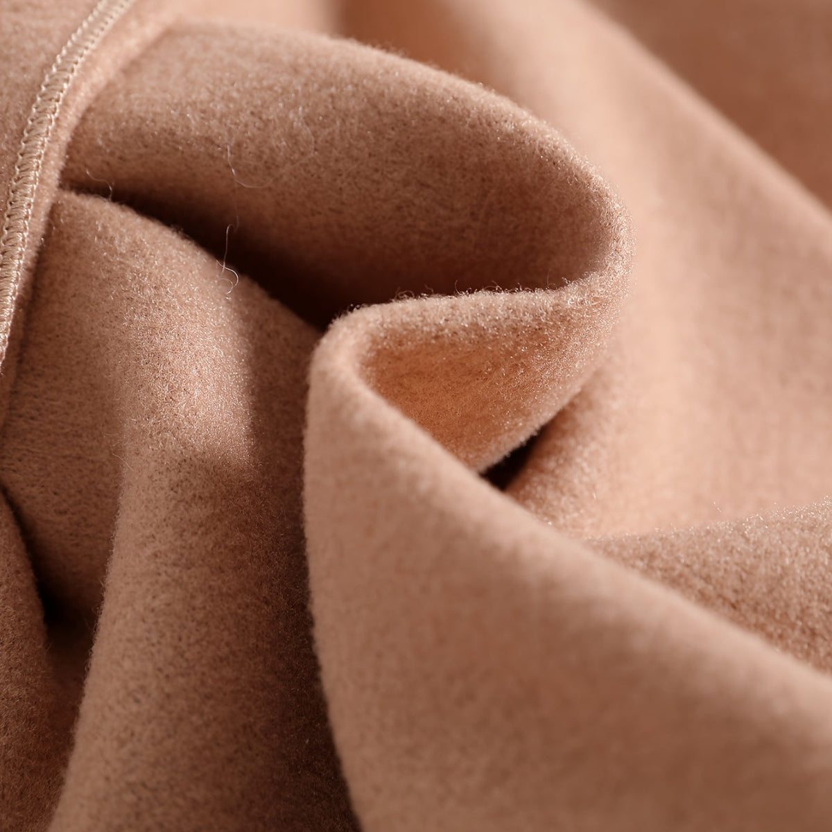 Keep your baby girl warm and stylish with our Winter Coat featuring a plush collar and bow. Perfect for chilly days.