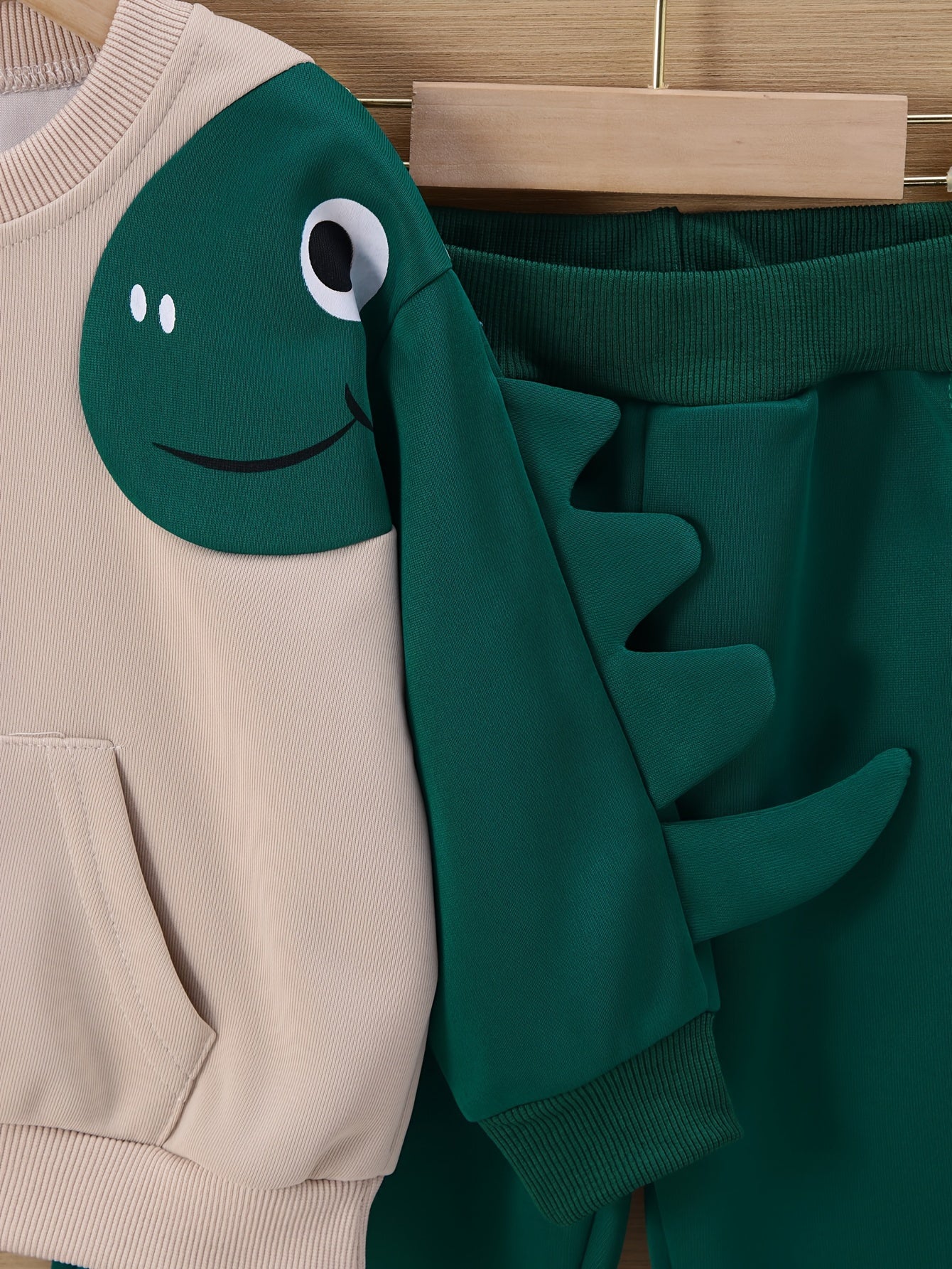 Explore comfort and joy with the Cozy Dinosaur Sweatshirt Set for Kids. Perfect for outdoor adventures. Discover more at Toosly.