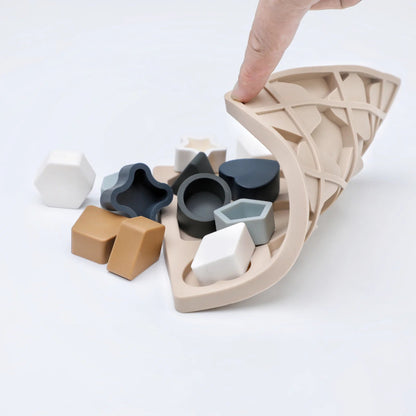 Soft silicone Montessori shape puzzle for kids. Safe, colorful, and sensory toy that builds logic, coordination, and early learning skills.