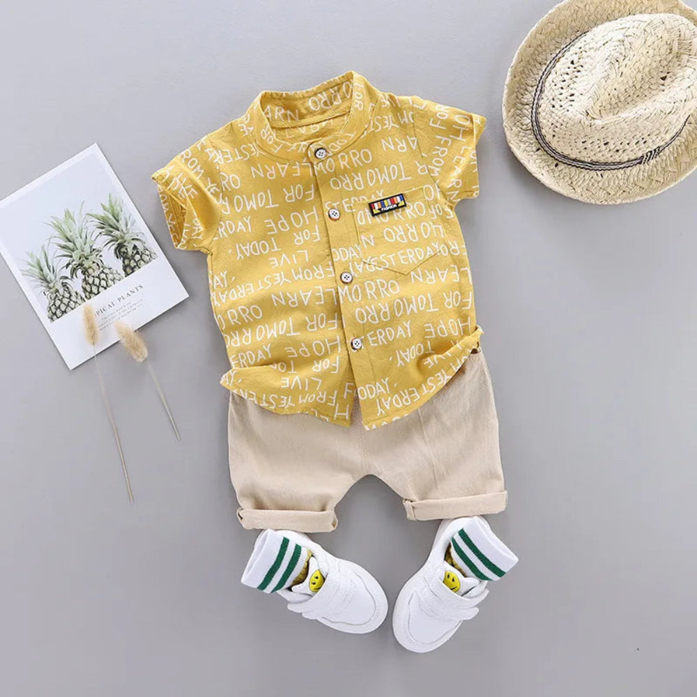 Trendy summer outfit for boys. Soft cotton letter shirt and comfy shorts — perfect for play, travel, and sunny days full of fun.
