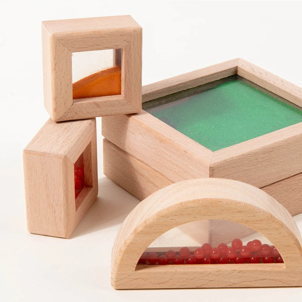 Colorful wooden and acrylic sensory blocks for kids. Safe, educational toy that builds creativity, focus, and sensory exploration.
