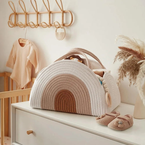 Cotton rope diaper caddy for baby essentials. Stylish, sturdy, and portable organizer that keeps nursery items neat and within reach.