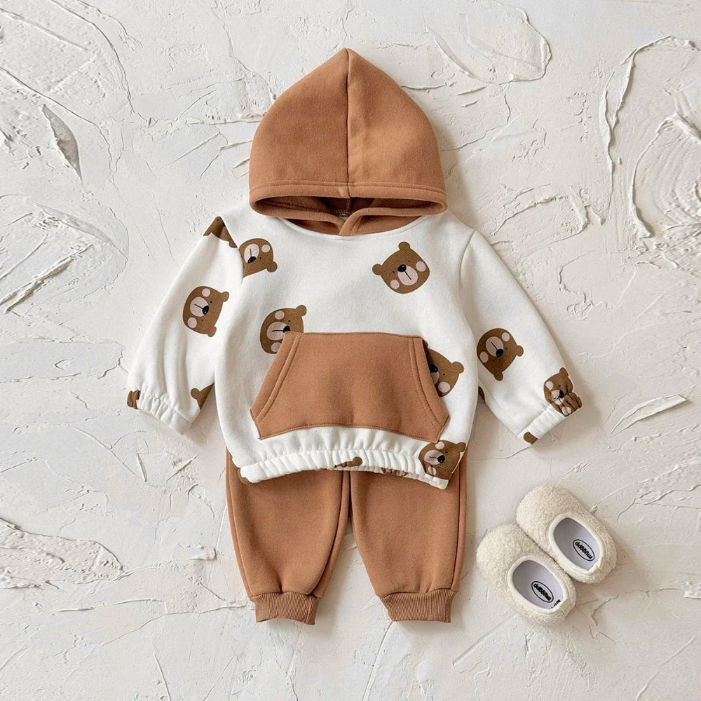 Adorable 2-piece bear winter outfit for babies. Soft, warm, and comfy set with hooded top and pants — perfect for cozy everyday wear.