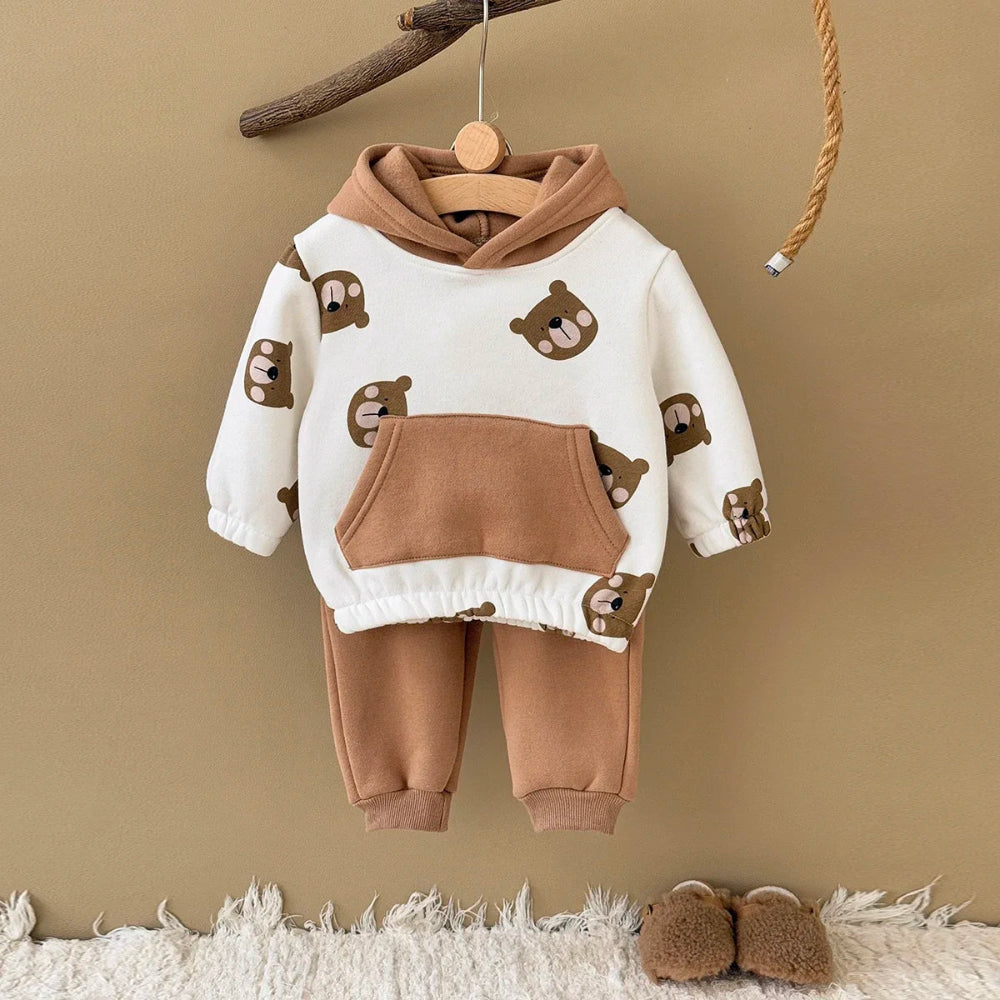Adorable 2-piece bear winter outfit for babies. Soft, warm, and comfy set with hooded top and pants — perfect for cozy everyday wear.