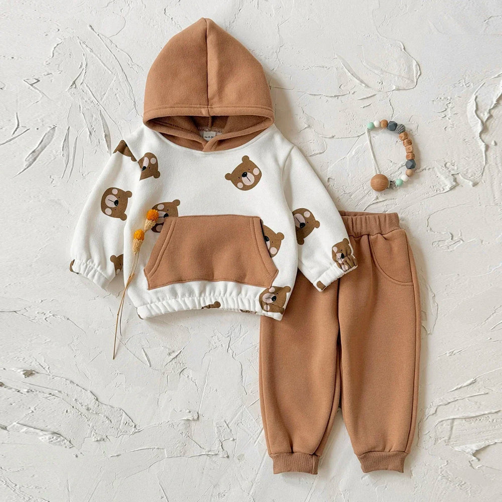 Adorable 2-piece bear winter outfit for babies. Soft, warm, and comfy set with hooded top and pants — perfect for cozy everyday wear.