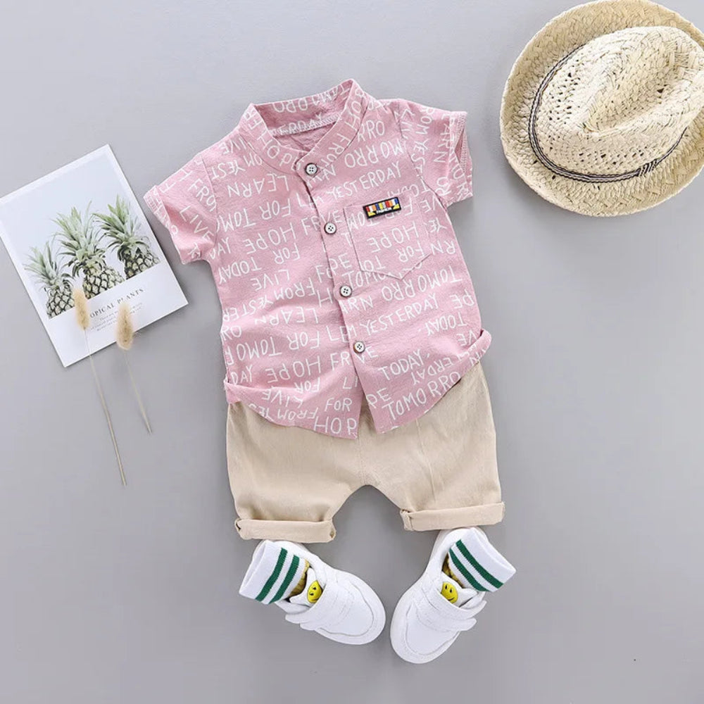 Trendy summer outfit for boys. Soft cotton letter shirt and comfy shorts — perfect for play, travel, and sunny days full of fun.