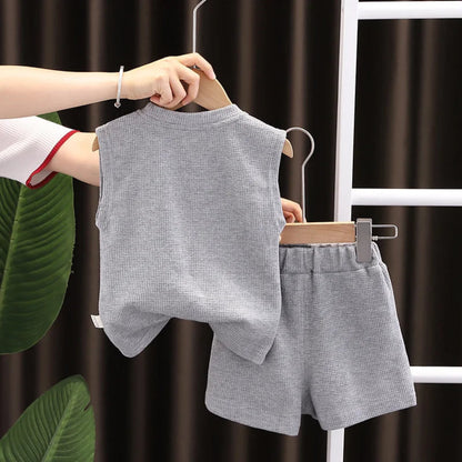 Lightweight cotton sports outfit for kids. Soft, breathable vest and shorts set perfect for summer play, comfort, and daily adventures.