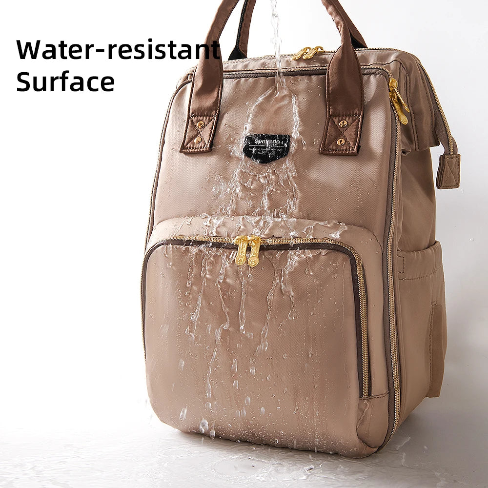 Spacious waterproof diaper backpack for moms and dads. Stylish, durable, and perfect for travel and everyday baby care.
