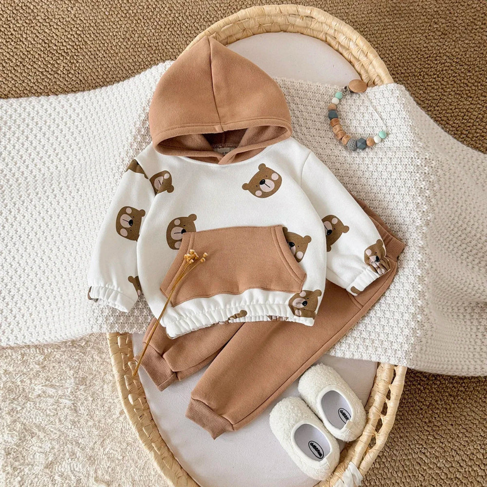 Adorable 2-piece bear winter outfit for babies. Soft, warm, and comfy set with hooded top and pants — perfect for cozy everyday wear.