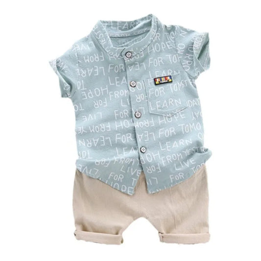 Trendy summer outfit for boys. Soft cotton letter shirt and comfy shorts — perfect for play, travel, and sunny days full of fun.