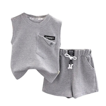 Lightweight cotton sports outfit for kids. Soft, breathable vest and shorts set perfect for summer play, comfort, and daily adventures.