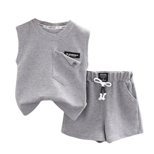 Lightweight cotton sports outfit for kids. Soft, breathable vest and shorts set perfect for summer play, comfort, and daily adventures.
