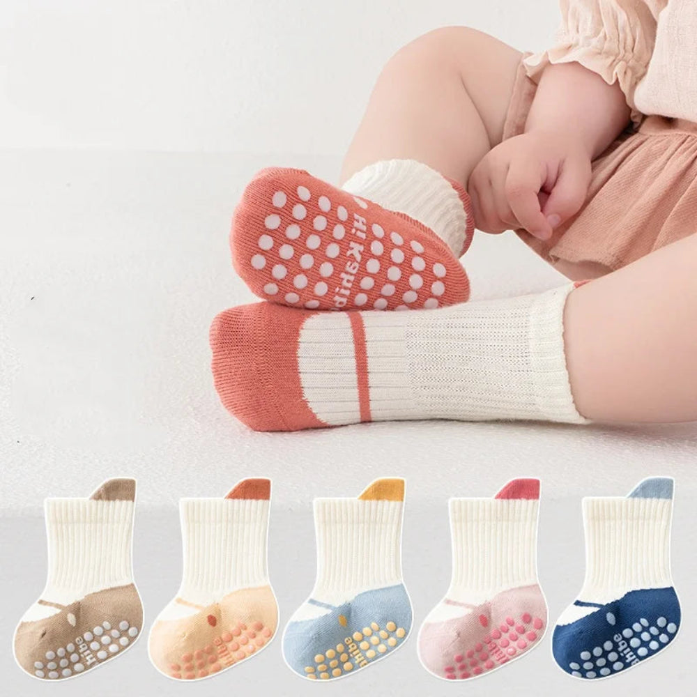 Soft cotton anti-slip socks for boys and girls. Safe, breathable, and comfy—perfect for playtime and daily wear all year round.