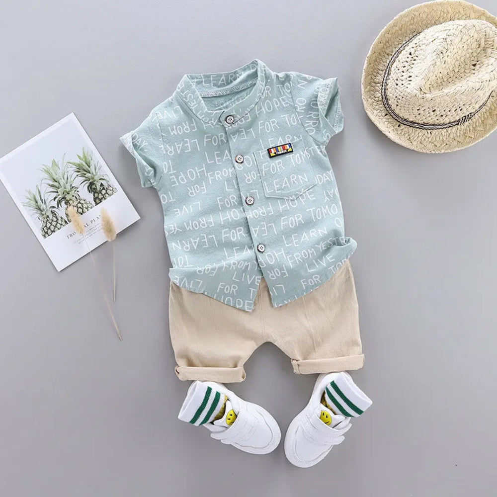 Trendy summer outfit for boys. Soft cotton letter shirt and comfy shorts — perfect for play, travel, and sunny days full of fun.