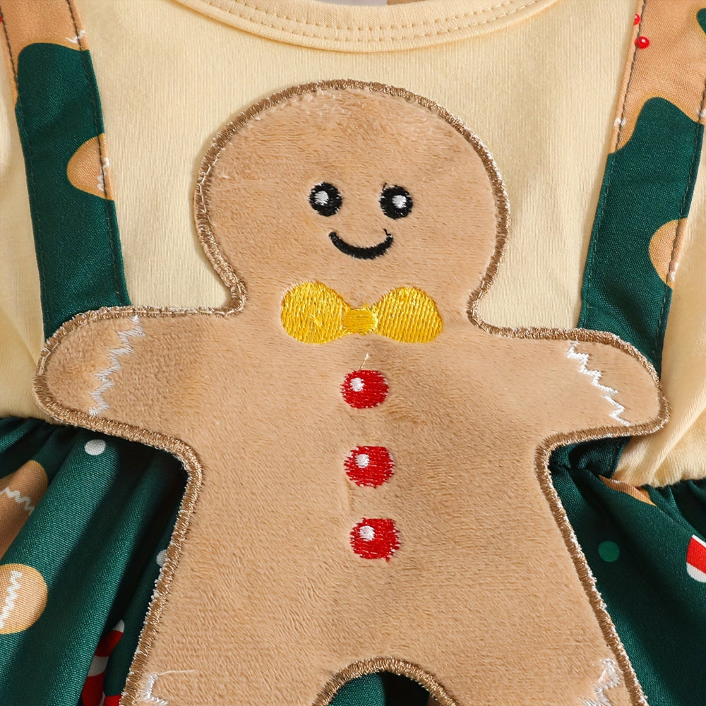Discover the Gingerbread Delight Dress for little girls. Perfect for the festive season with comfort and style. Toosly: care and safety in every detail.