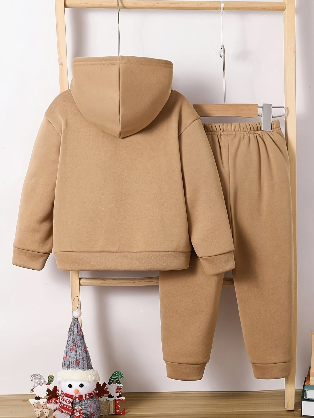 Discover warmth and festive fun with our Cozy Reindeer Hoodie & Sweatpants Set. Perfect for joyful adventures. Shop now at Toosly.
