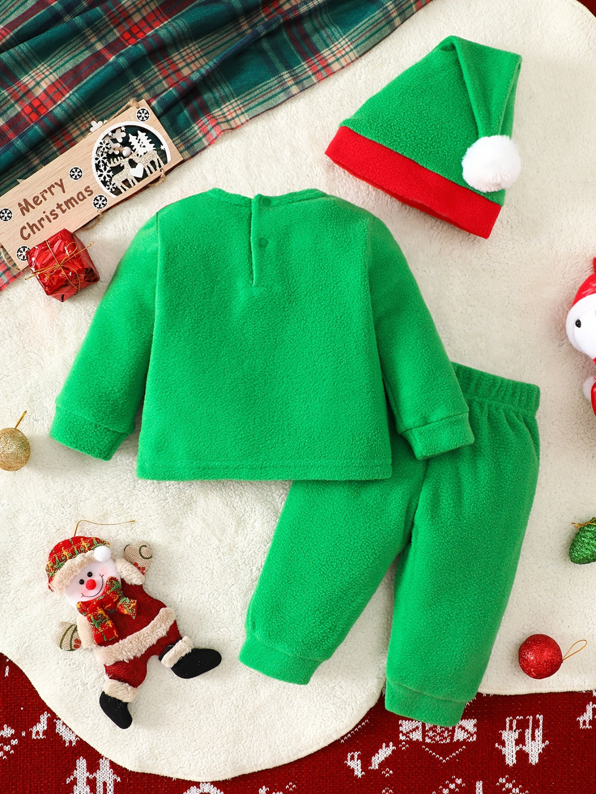 Discover the Cozy Christmas Elf Outfit for Kids. Perfect for warmth and festive fun. Ideal for ages 0-3. Toosly: care and safety in every detail.