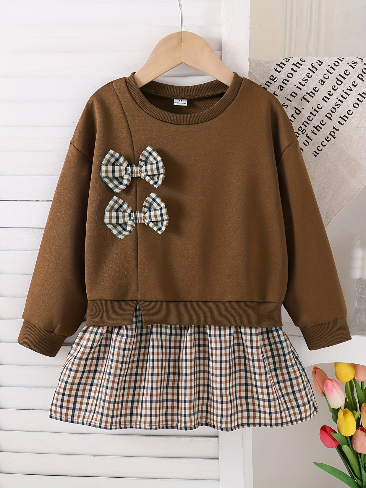 Discover the Charming Plaid Dress with Bow for Girls. Perfect for autumn and winter, offering comfort and style. Explore more at Toosly.