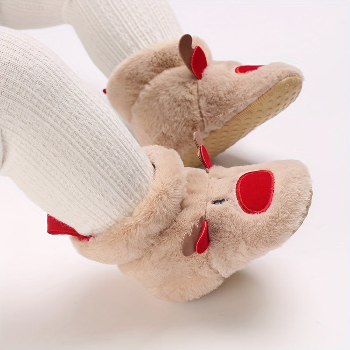 Discover the Cozy Reindeer Baby Booties for a warm and joyful winter. Perfect for first steps. Available at Toosly.